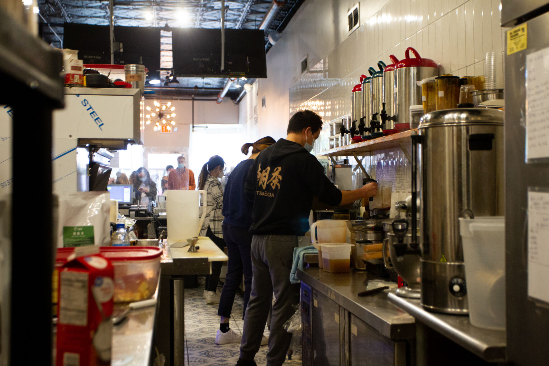 4/27/21 Boba Shortage: Workers w/ Tsaocaa sweater in focus
